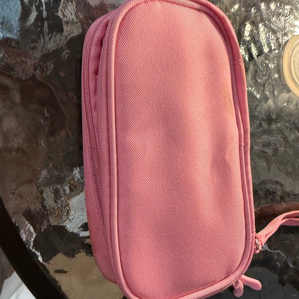 Pink zippered tech accessories pouch